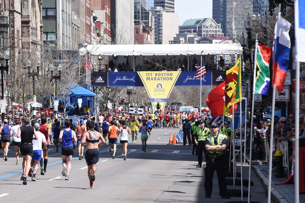 Boston Marathon runners approach the finish line