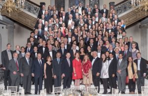 professional organization group on stairs indoors